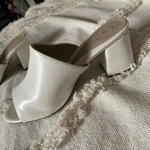 White heeled mules